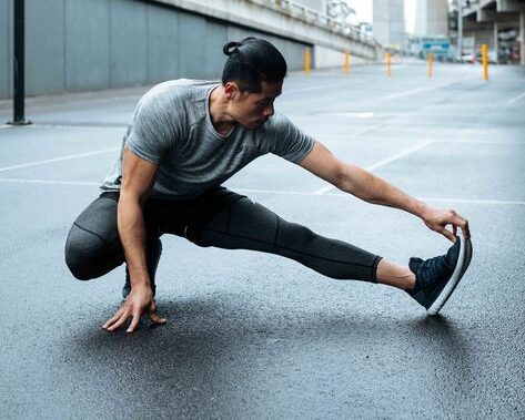 نکات نگهداری لباس ورزشی | گرم کردن ورزشکار